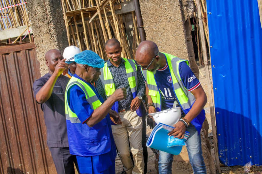 workers with former president Olusegun Aremu Obasanjo at the construction OOPL Cinema